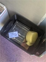 Plastic bin with household items