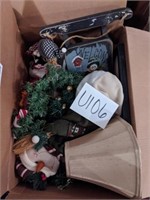 Box of snowman themed decorations