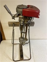 Antique Neptune Outboard motor with stand