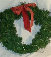 19" Wreath with silver hearts and red bow