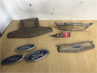 Intake lot of Chevrolet Ford Buick emblems hood