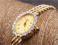 Seiko 14k and diamond watch