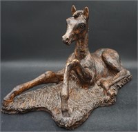 Woodcraft foal statue
