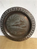 Vintage large brass pierced charger plate .
