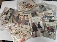 Vintage lot of kids clothes sewing patterns .