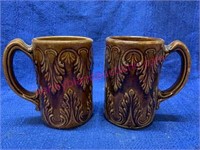 Pair of old brown stoneware mugs