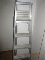 5ft aluminum ladder and 5 milk crates