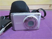 CANNON CAMERA WITH CASE& BATTERY CHARGER
