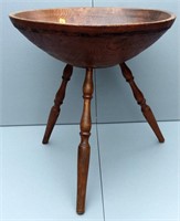 Wooden bowl on legs