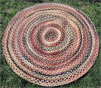 Round hand braided wool rug,