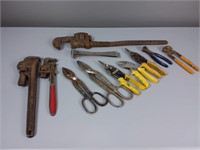 Tin Snips And Pipe Wrenches
