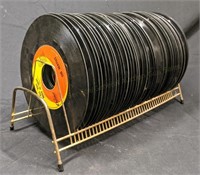Wire Rack Full of 45 RPM Records