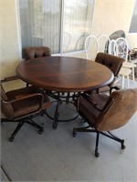 Round Dining Table And 4 Rolling Chairs