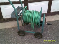 Garden Hose On 4 Wheeled Cart