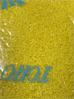 Toho 15/0 hex seed bead. Opaque yellow. Two boxes