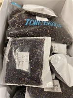 Toho 15/0X seed bead. Metallic purple iris. Three