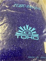 Toho 15/0X seed bead. Transparent cobalt. Two