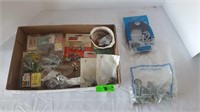 Selection of nuts and bolts, screws, grease