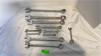 Assorted sized combination & open ended wrenches