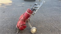 Golf bag, clubs, tees and golf balls