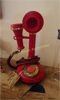 Red vintage style rotate dial phone