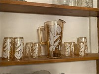 CARNIVAL GLASS PITCHER AND TUMBLERS