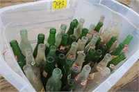 Tub full of old glass pop bottles