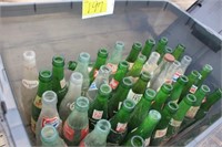 Tote of glass pop bottles