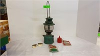 Antique Coleman kerosene lantern. Includes funnel