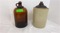 Vintage glass whiskey jug & vintage stone jug. No