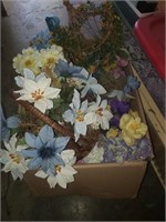 Large box of floral arrangements.