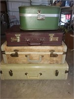 Lot of vintage suitcases.