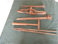 Group of primitives including forge tongs, more
