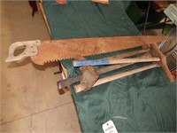 Group of primitives including railroad hammer, mor
