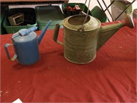 (2) primitive watering cans