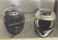 Motorcycle Helmets. Black helmet is Large. Grey...