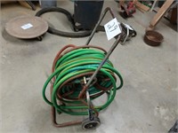 Garden hose on reel and cart