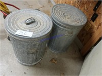 2 metal garbage cans