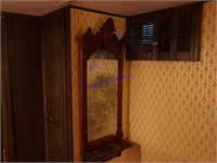 Walnut wall mirror, detailed and ornate