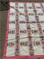 Pink bordered quilt