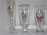 Assorted beer advertising glasses