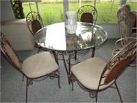 Wrought iron &  cane, glass top table, 4 chairs wi
