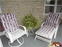Lounge chair & round table on front porch
