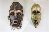 TWO AFRICAN WOOD CARVED MASKS