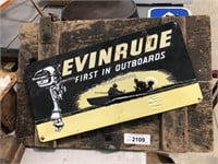 Evinrude tin sign mounted to board, 14x21