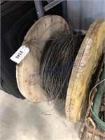 Wood spool of used electric fence wire