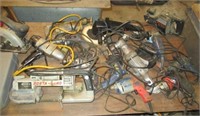 Large group of power tools including porter
