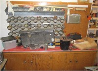 Bench with contents including tool box, hardware,