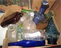 Decorative glassware including decanters, vase,