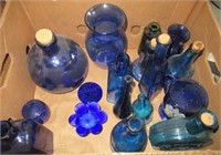 Various cobalt blue glassware including bottle,
